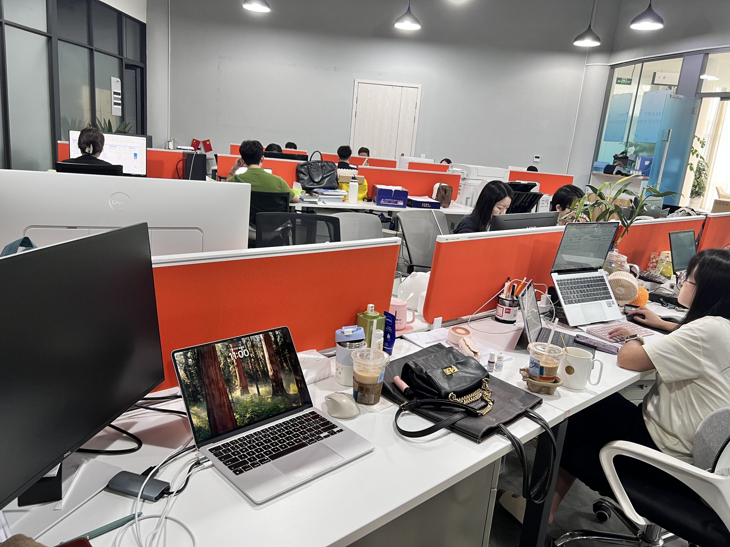 AhaX team working at desks in the Chengdu office