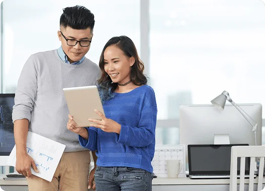 Chinese software engineers collaborating in office